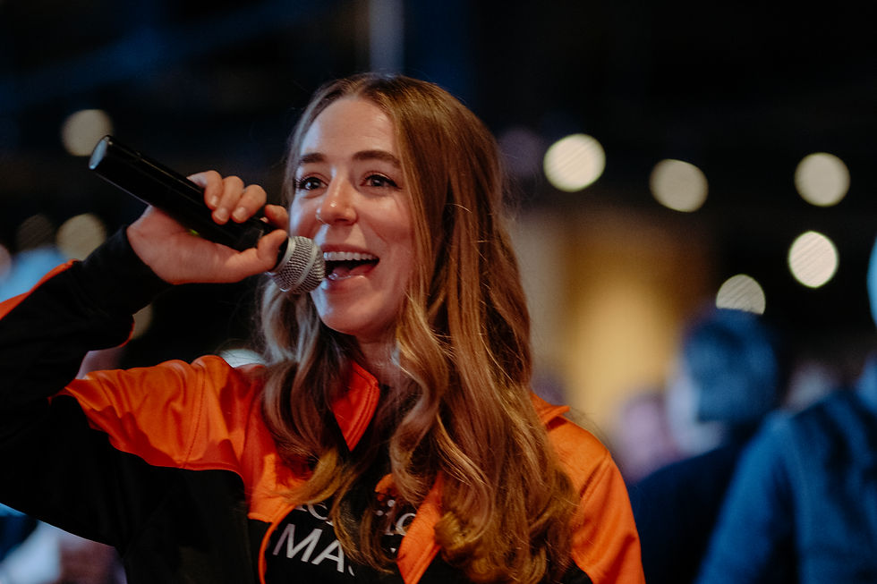 Henricksen Employee with a microphone
