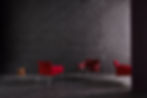 Modern red office chairs with chrome legs, available through Henricksen's contract furniture services.