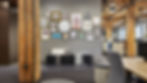 Modern office waiting area with a gallery wall and comfortable modular seating at Henricksen.