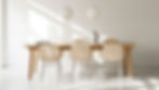 Modern dining or meeting area with a simple wooden table and comfortable chairs. Office design by Henricksen.