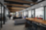Close-up of a stylish office space designed to promote relaxation and informal collaboration. Office furniture solutions by Henricksen.